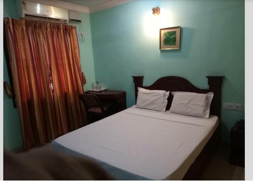 Hotel Priya Chengannur Номер фото